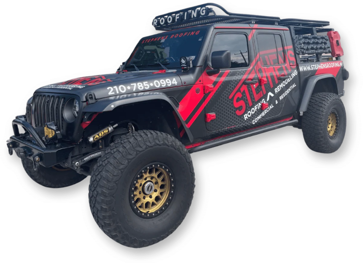 The Stephens Roofing Jeep, wrapped in red and black with the company phone number